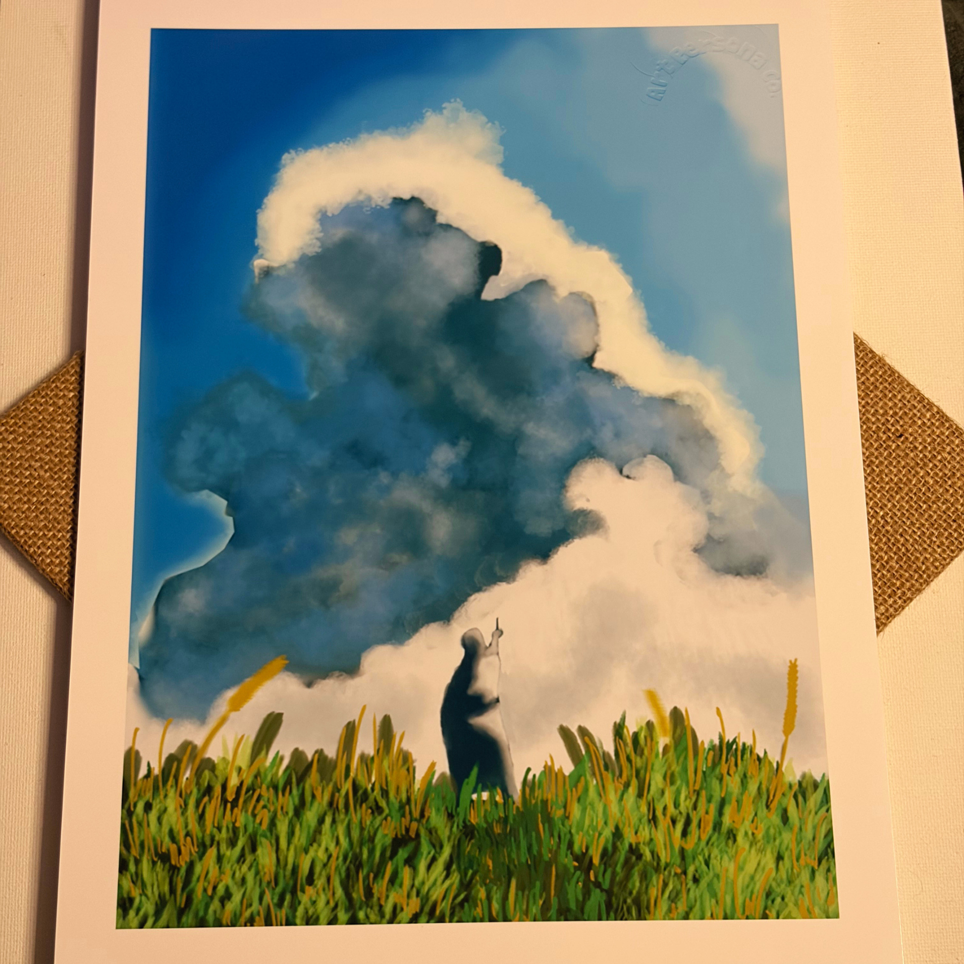 Artistic depiction of a person standing on grass with a large cloud in the background
