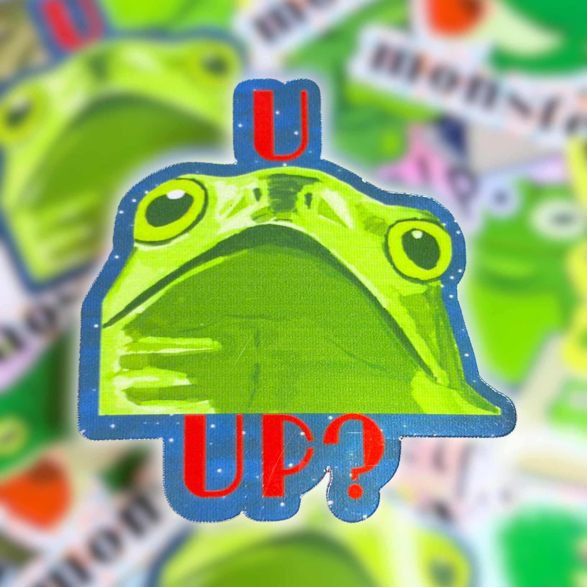 Green frog looking curious with red text saying U Up?