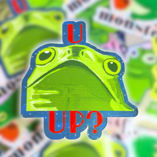 Green frog looking curious with red text saying U Up?